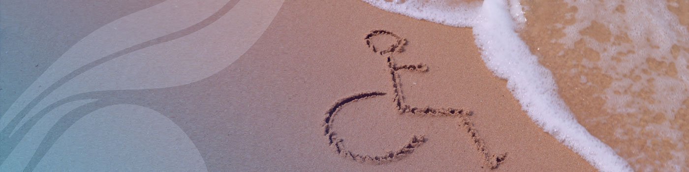 wheelchair drawn in the sand